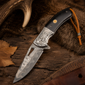 Wolf Engraved Damascus-Pattern Folding Knife with Black Handle & Leather Lanyard – Outdoor Collector Gift