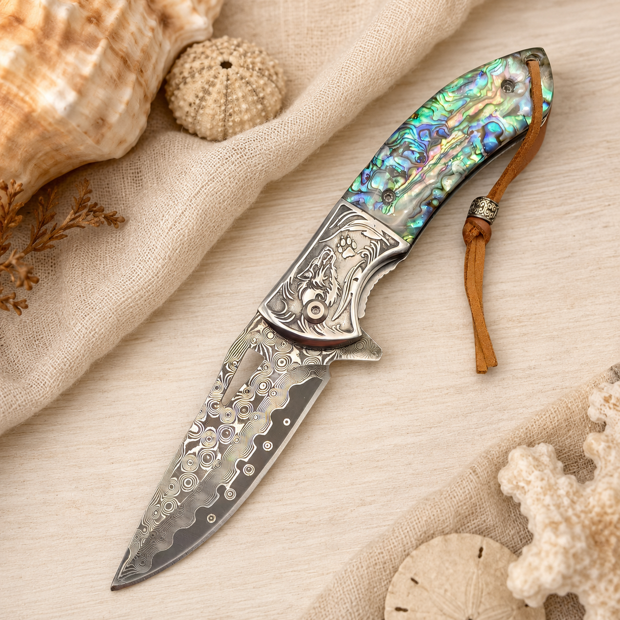 Wolf Engraved Damascus-Pattern Folding Knife with Iridescent Shell Handle & Leather Lanyard